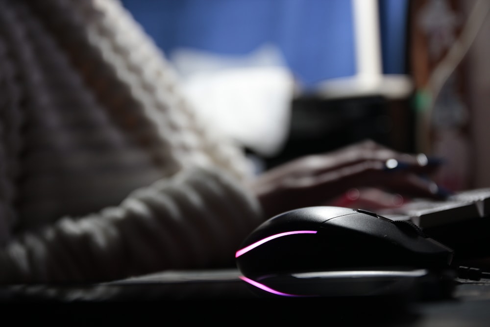 a close up of a computer mouse on a desk