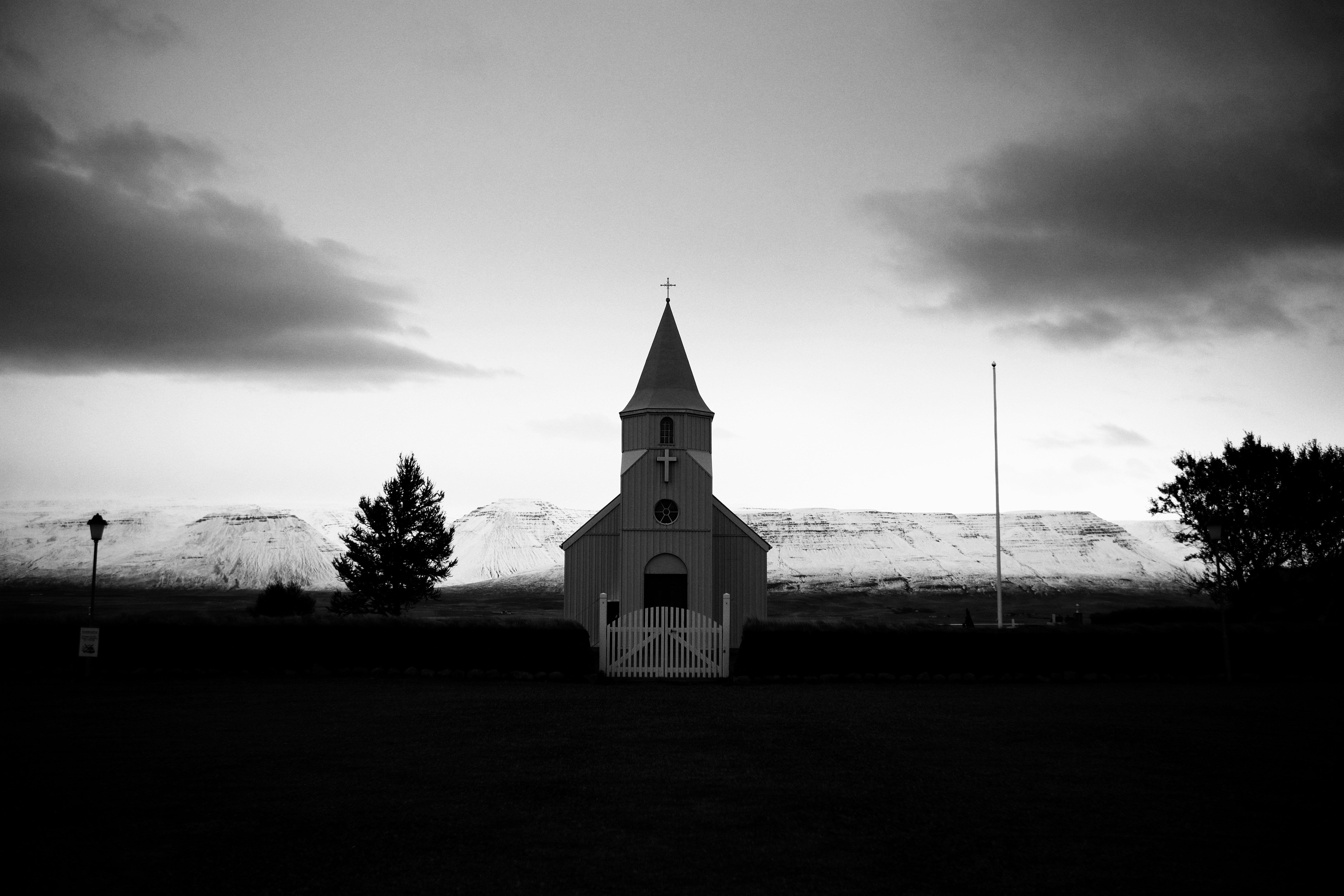 a black and white photo of a church