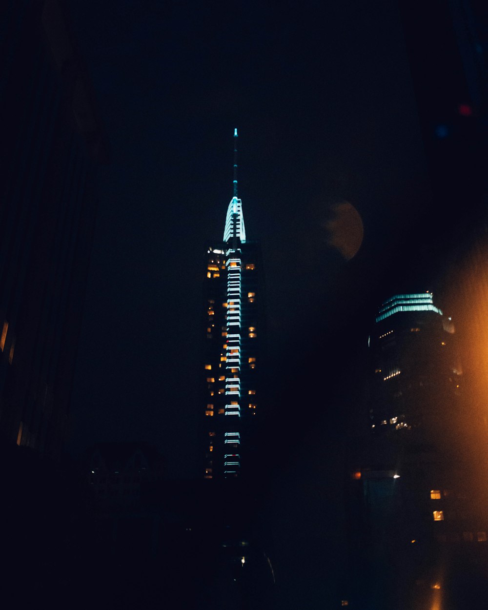 a very tall building lit up at night