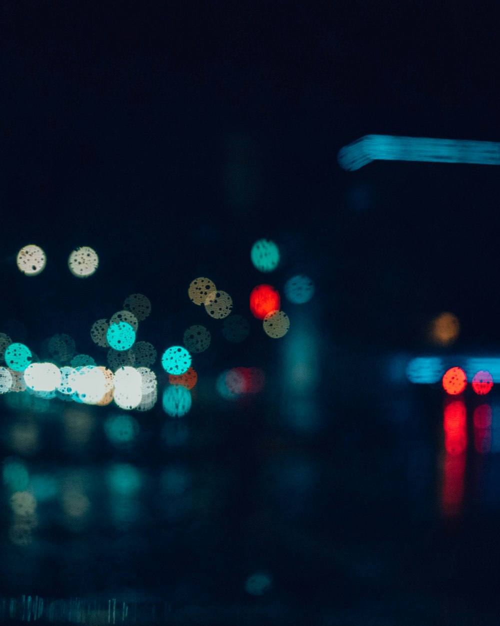 a blurry photo of a city street at night