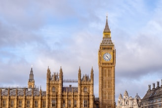the big ben clock tower towering over the city of london
