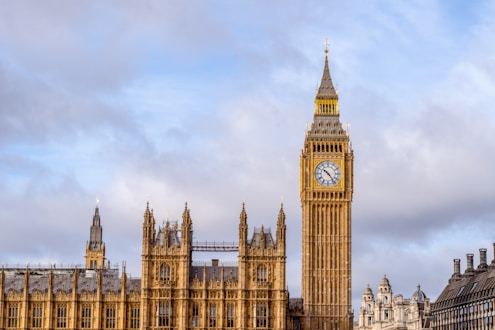 the big ben clock tower towering over the city of london