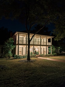 A well-maintained Birmingham rental property exterior with welcoming lighting.