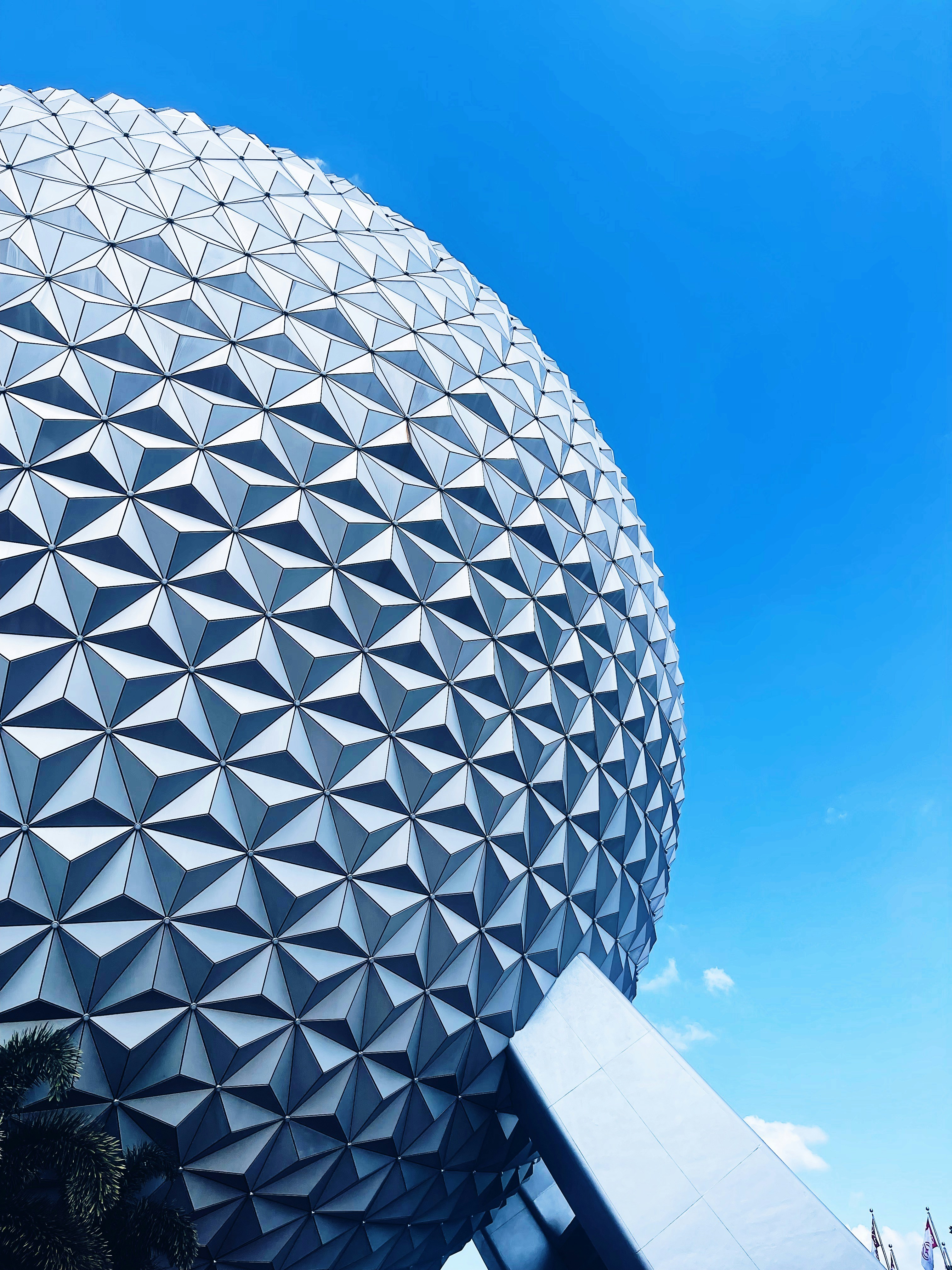 a close up of a building with a blue sky in the background