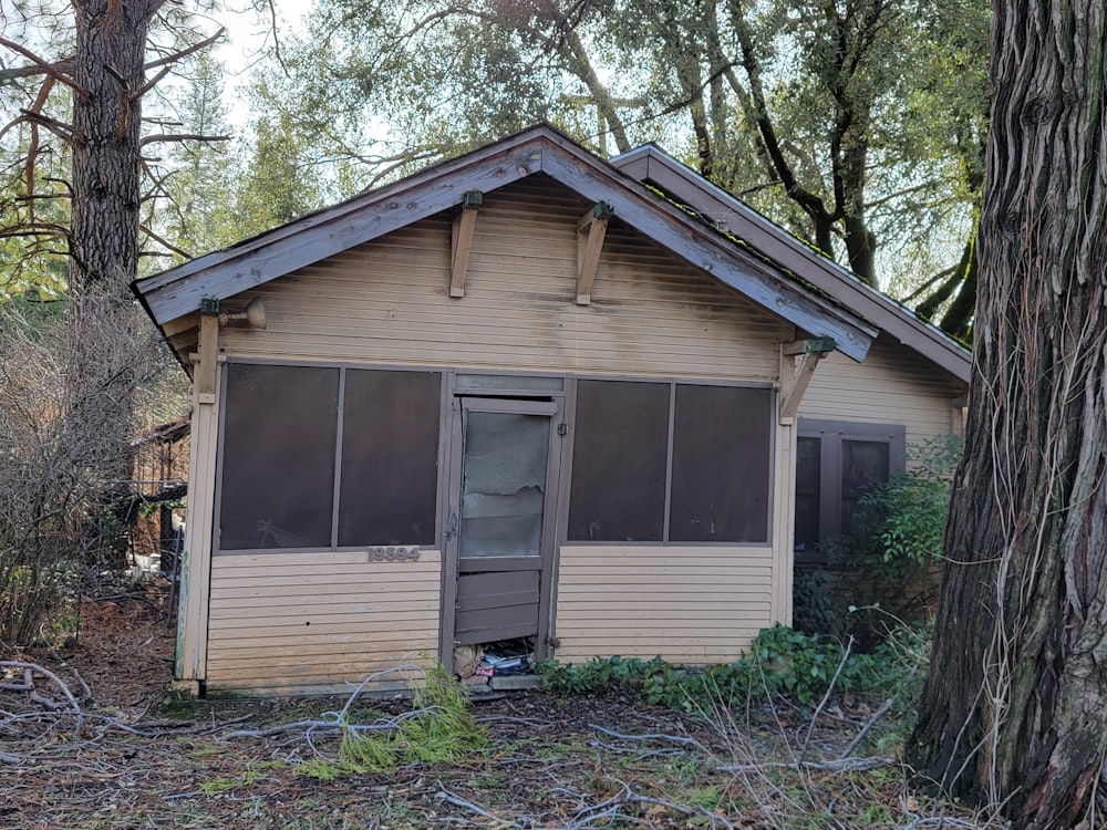 an old run down house in the woods