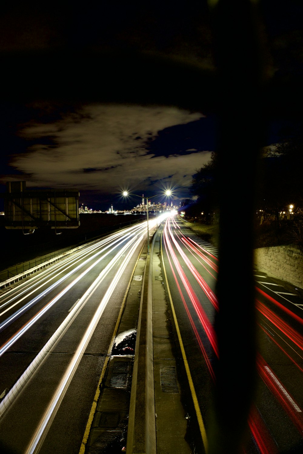 a view of a highway at night with long exposure