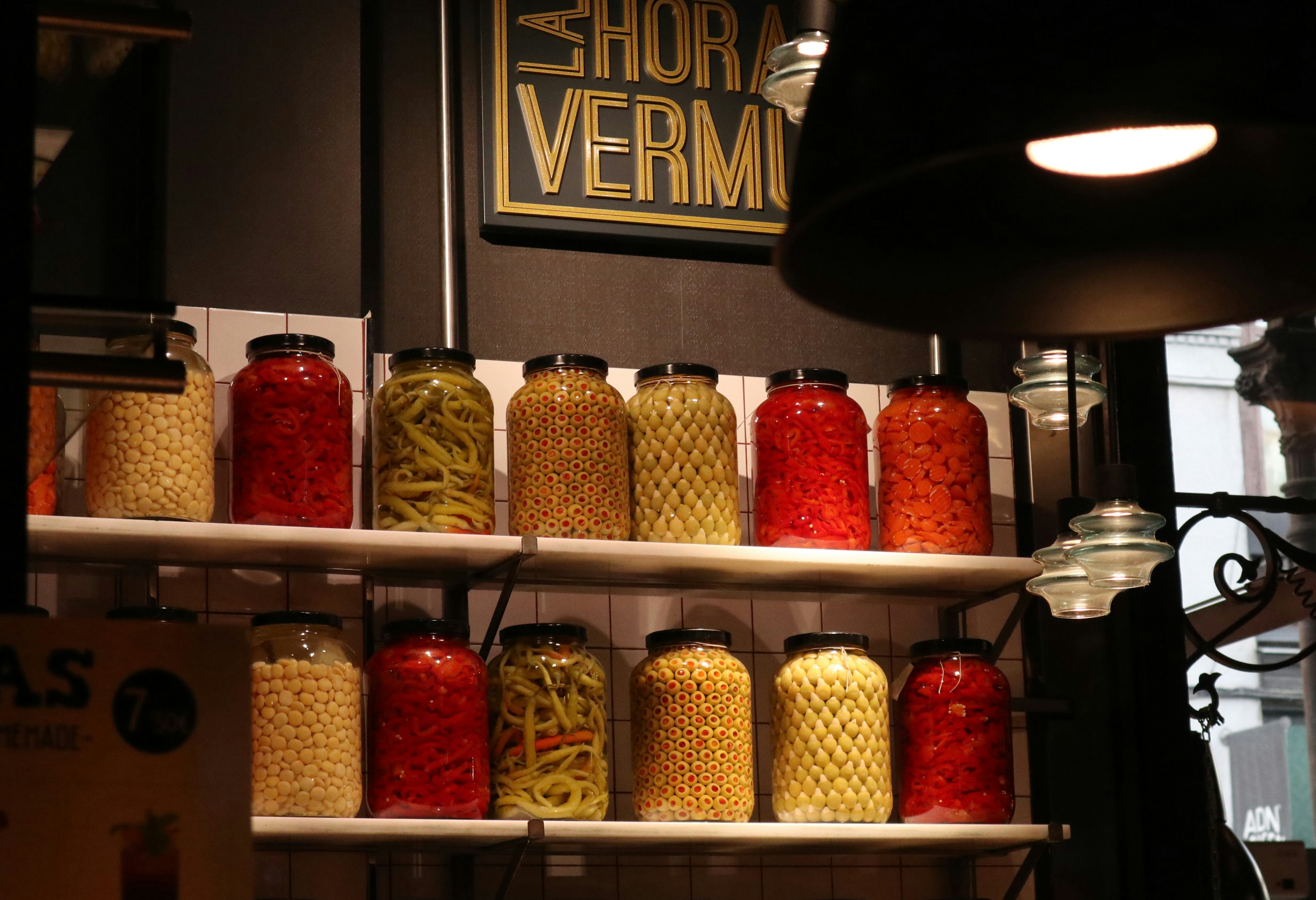 a shelf filled with lots of different types of food