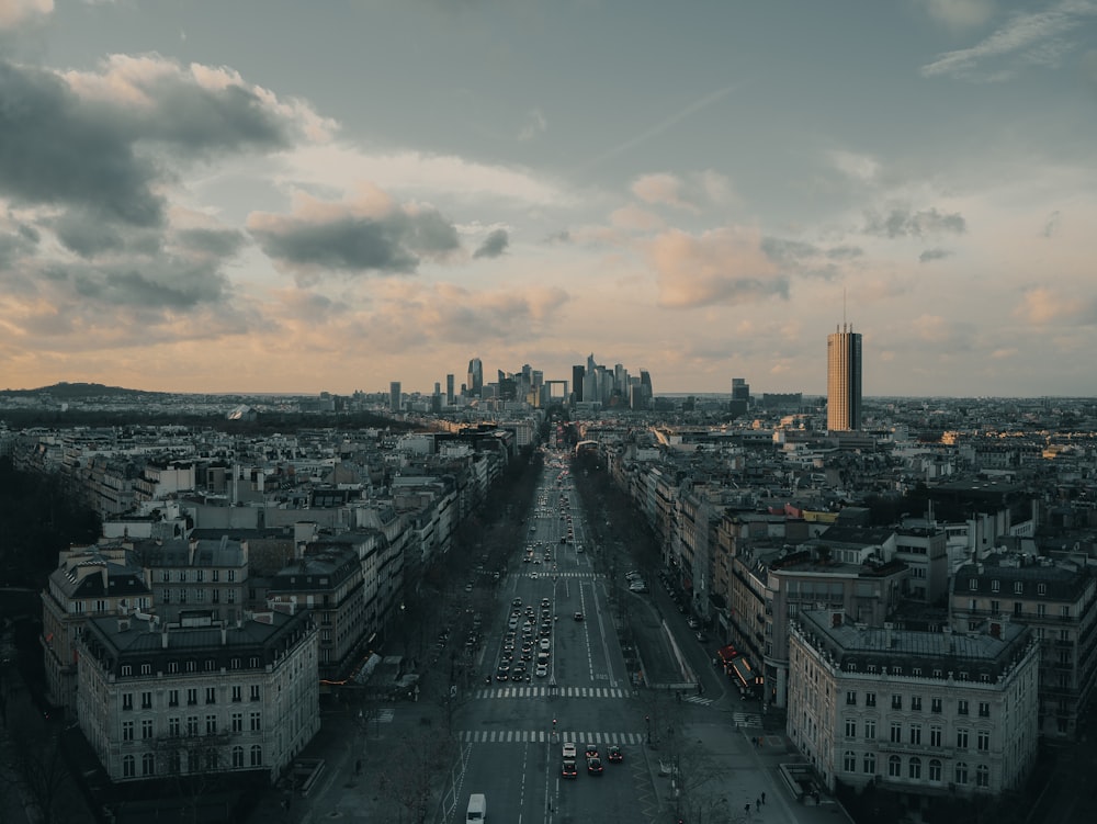 an aerial view of a city with tall buildings