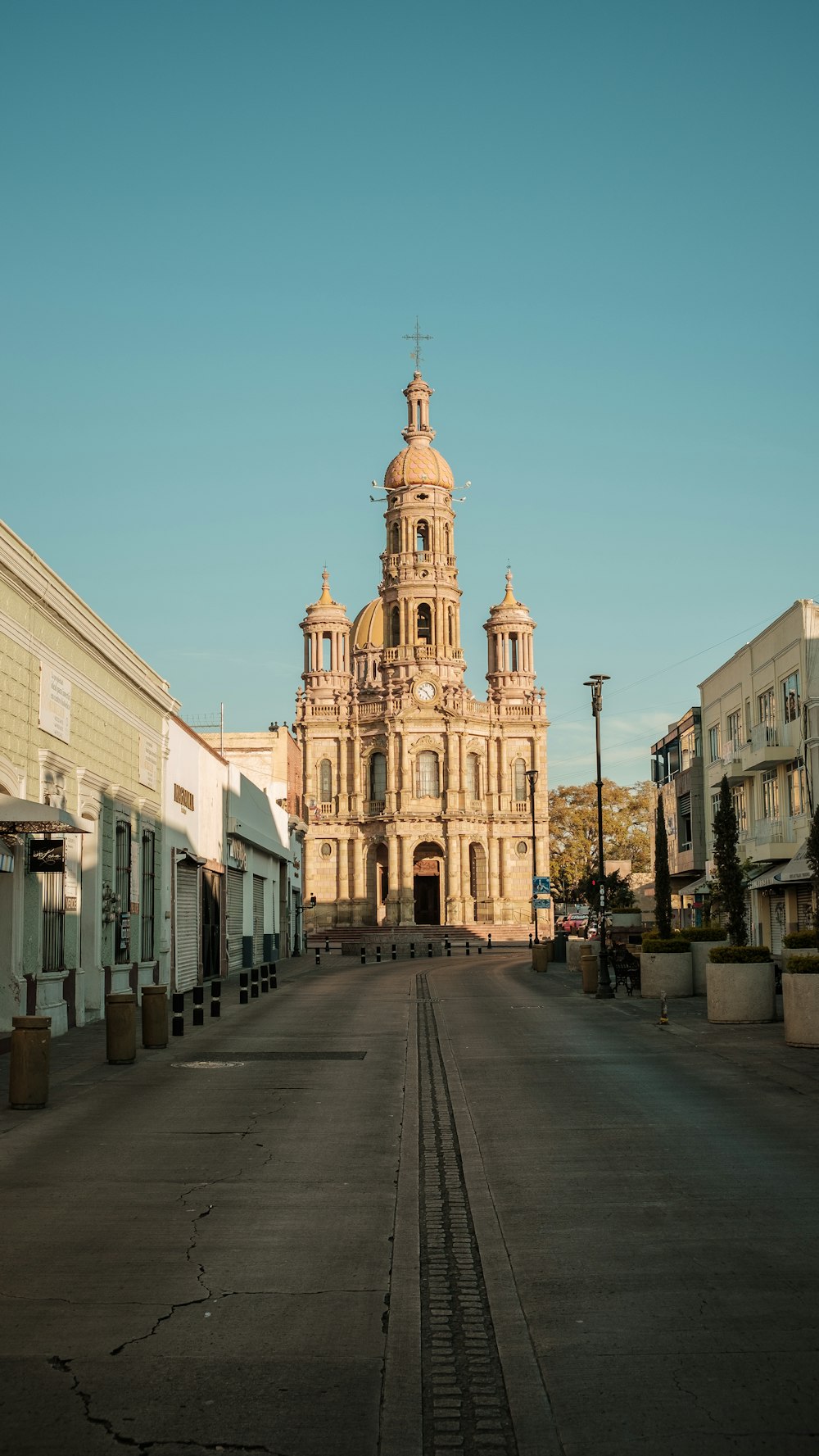 a large building sitting on the side of a road