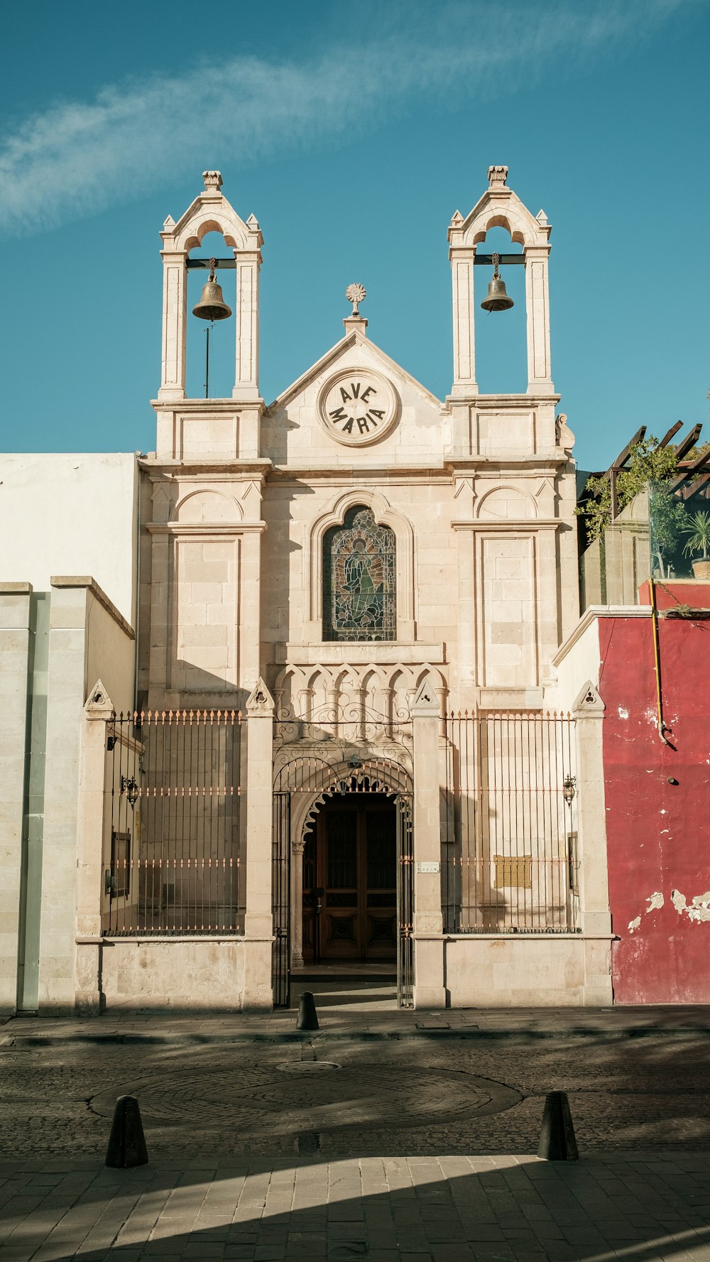 a church with a clock on the front of it