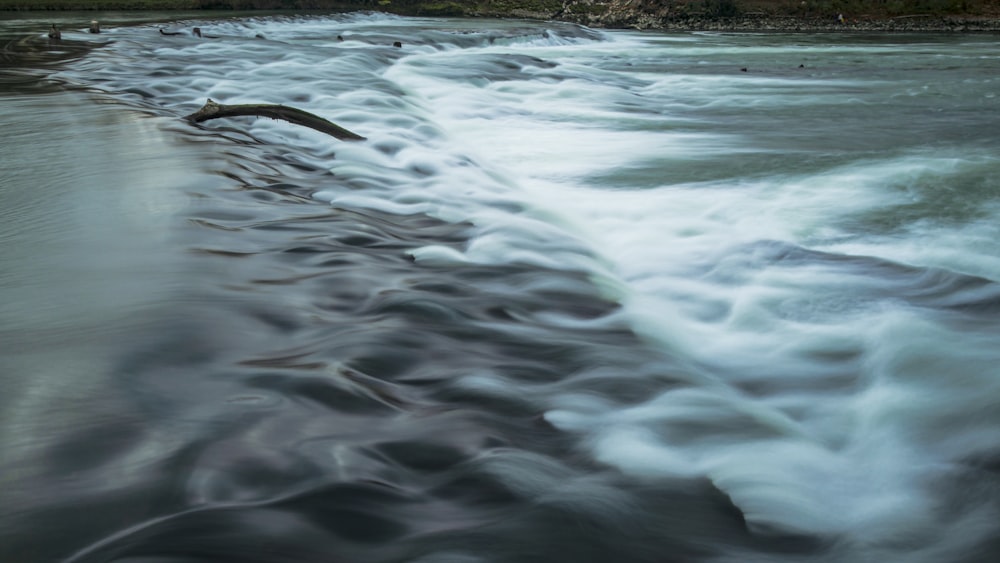 a river that has some water flowing over it