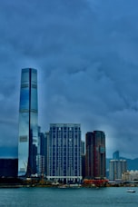 a large body of water with a city in the background