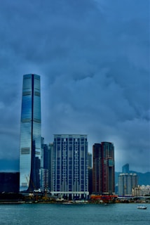 a large body of water with a city in the background