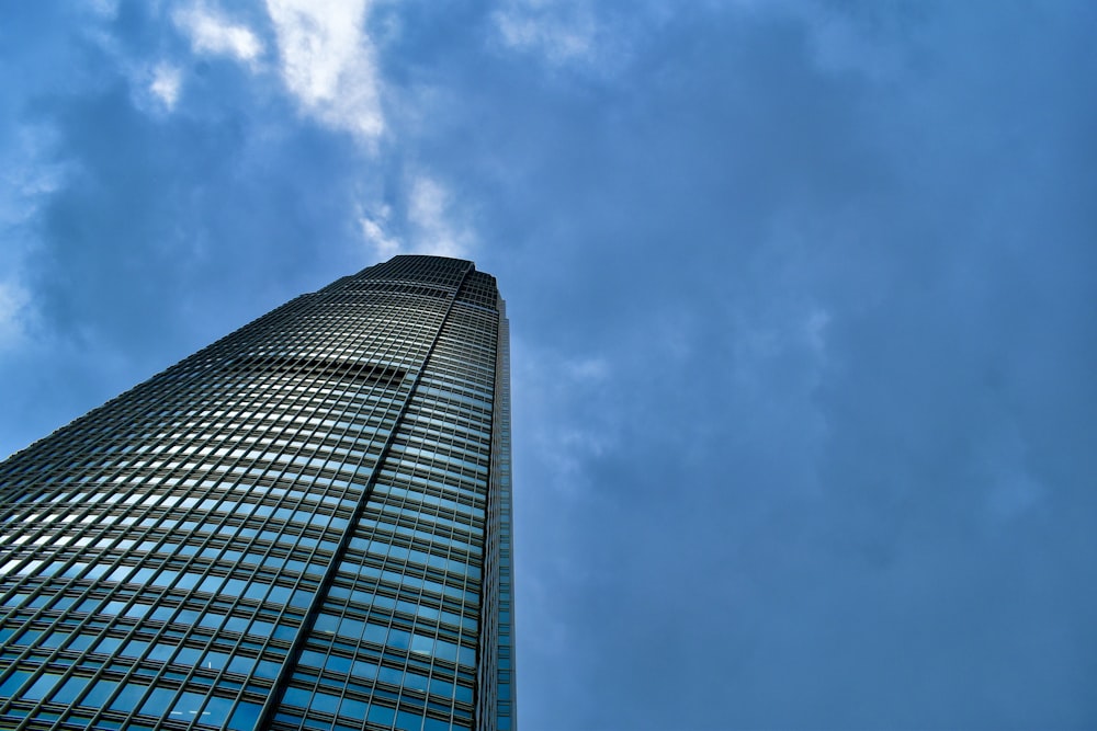 a very tall building with a sky in the background