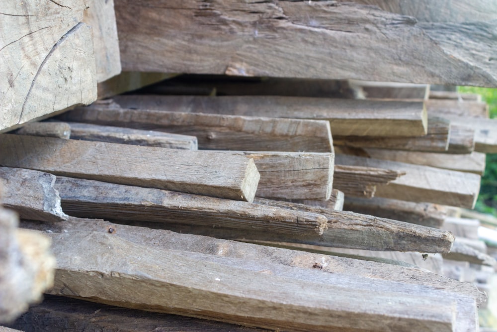 a pile of wood sitting on top of a wooden floor