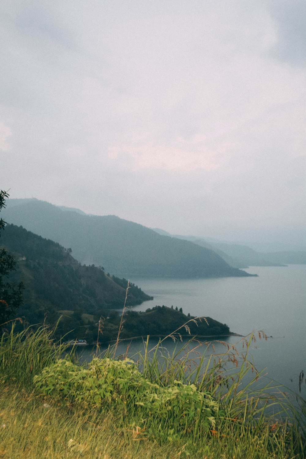 a view of a body of water from a hill