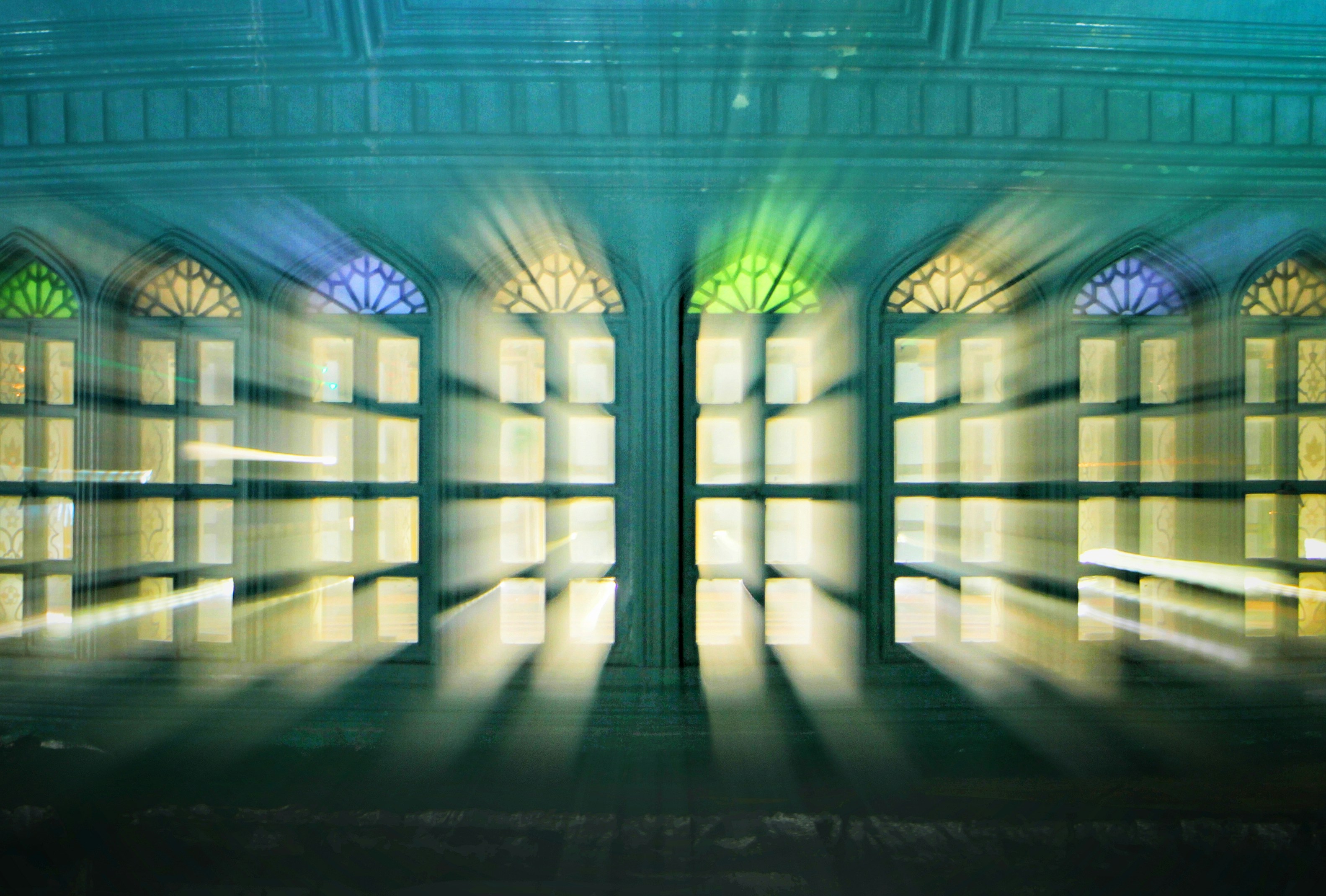 a blurry photo of a room with windows