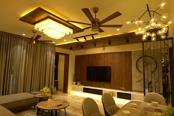 A well-lit residential living room showcasing advanced electrical installations.