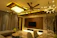 Photo of a modern living room with a sleek ceiling fan softly spinning.