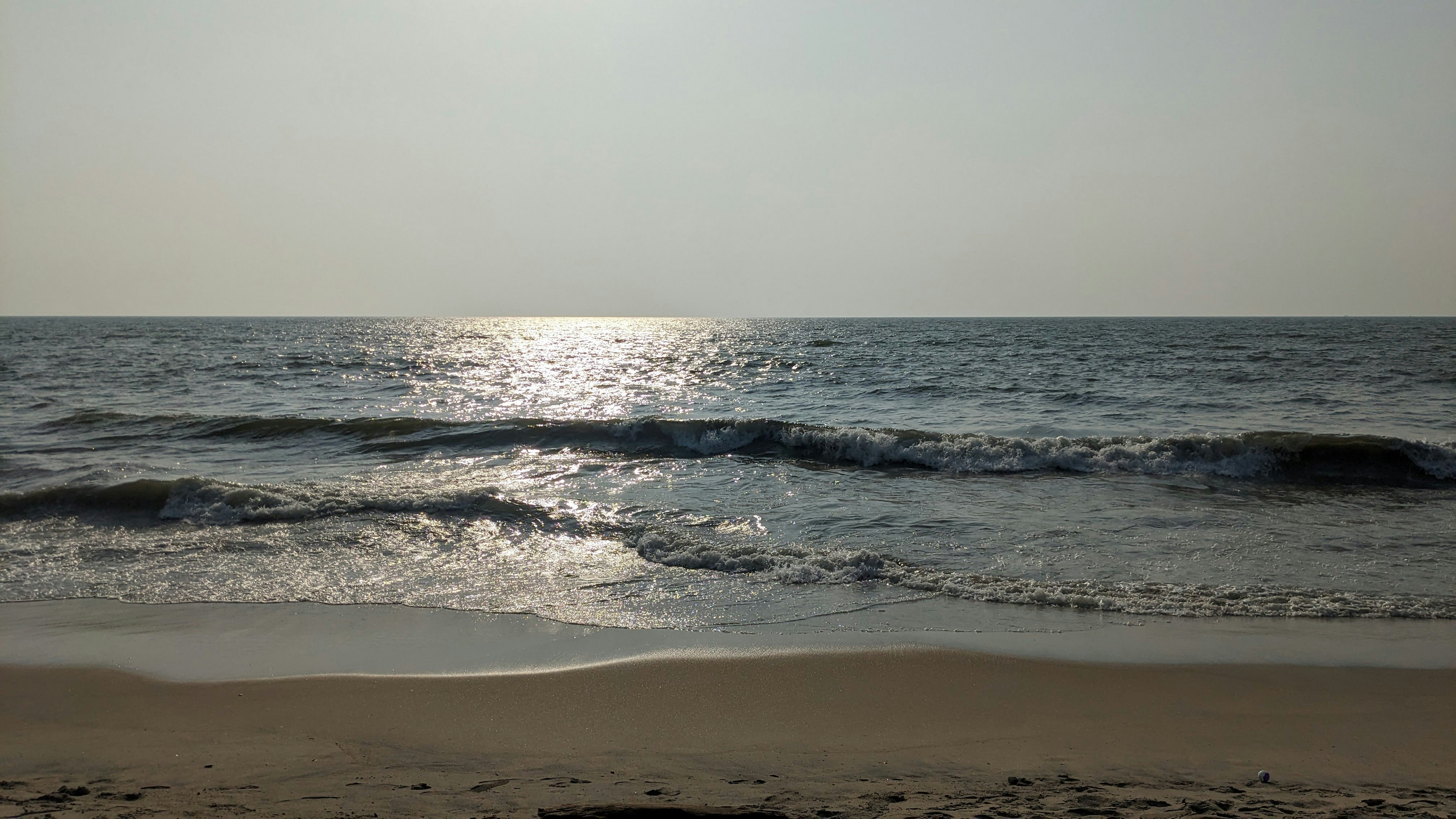 a view of the ocean from a beach