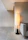 A compact, elegantly furnished apartment corner showcasing smart furniture design.