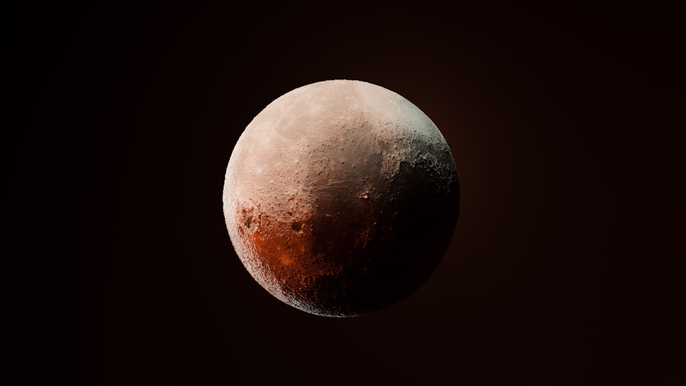 a close up of a half moon in the dark sky