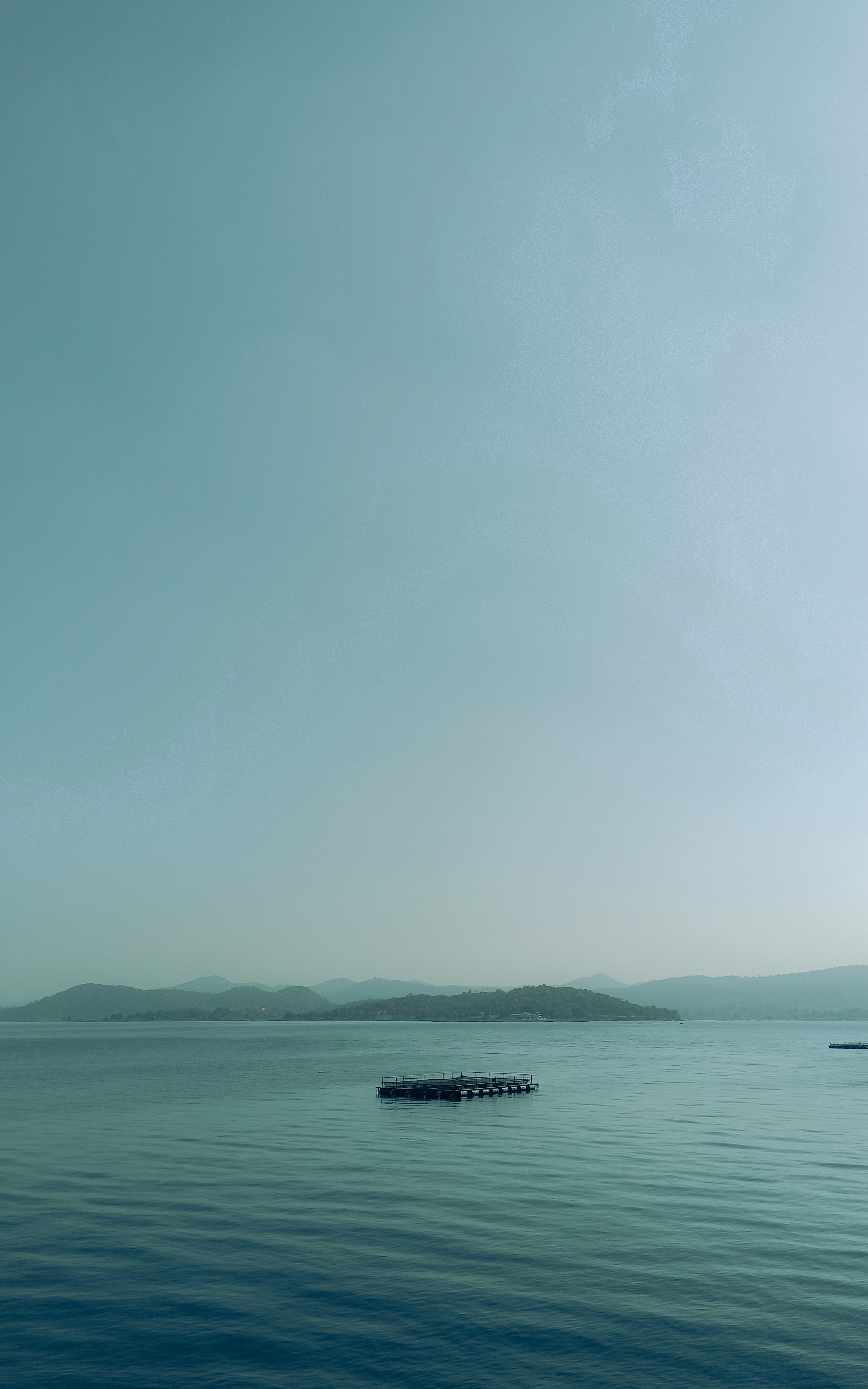 a body of water with a few boats in it