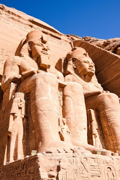 the statues of pharaohs and queens of egypt