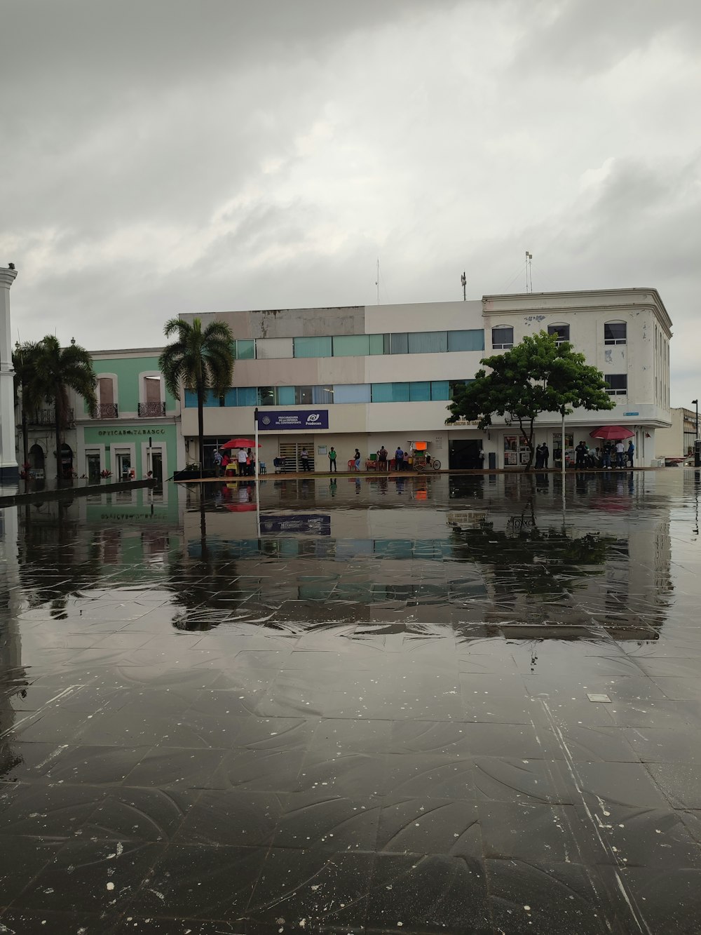 a large building with a lot of water in front of it