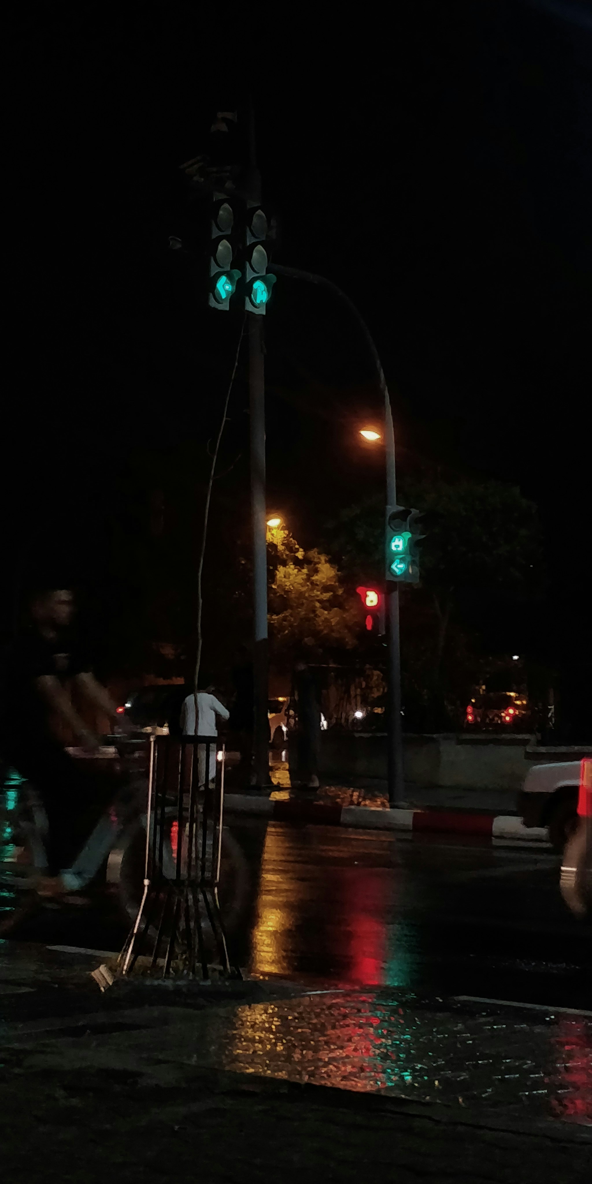 a traffic light sitting on the side of a road