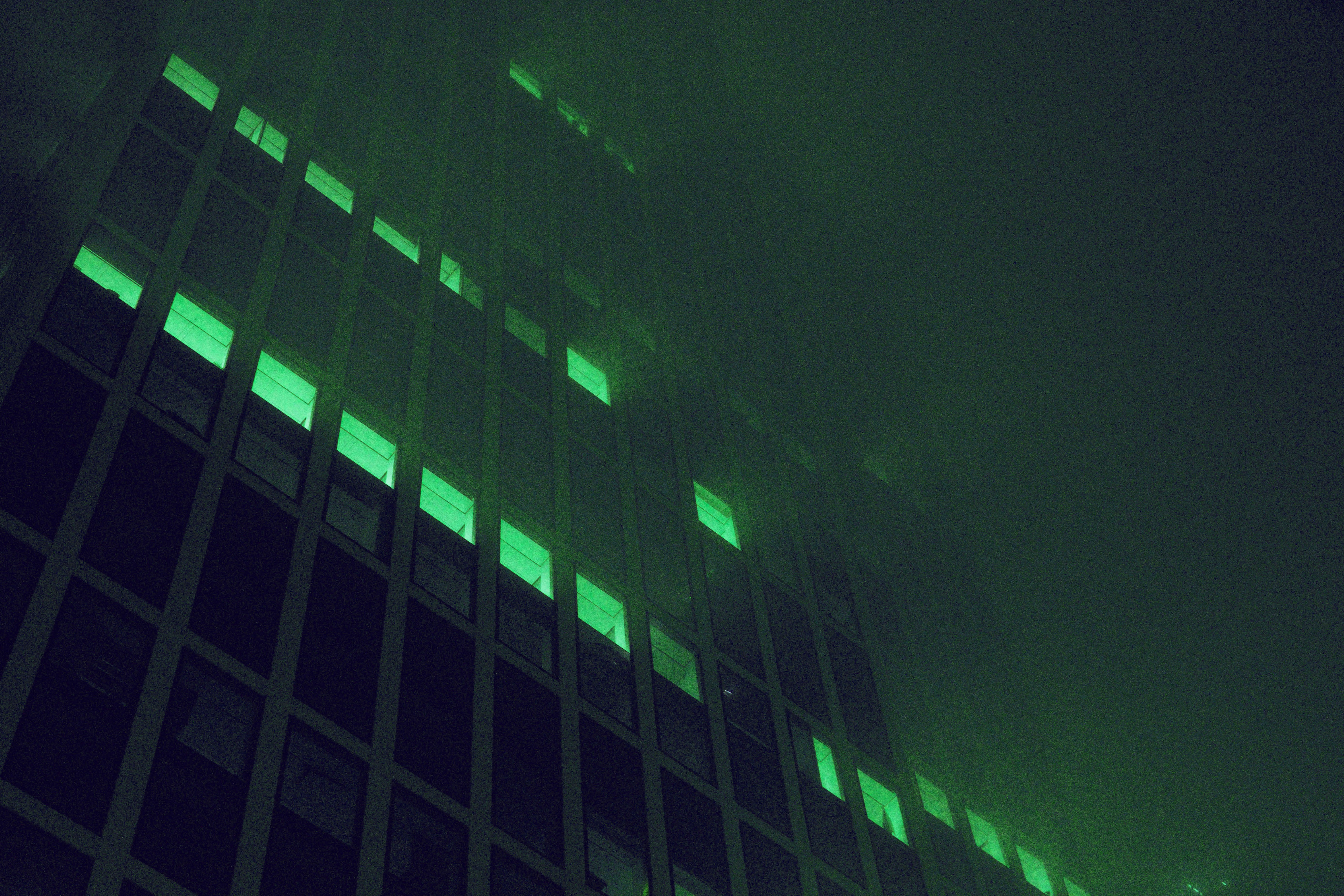 modern bank building with digital security overlay dark theme