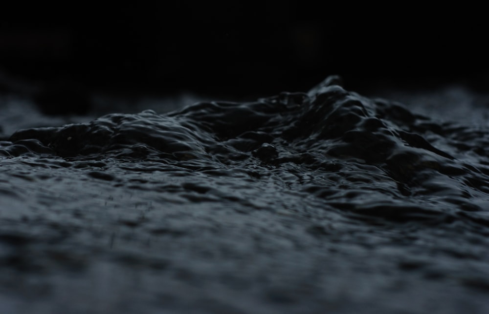 a black and white photo of a pile of dirt