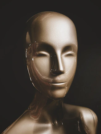 Close-up of a sleek, modern wig displayed on a minimalist white stand with soft natural lighting.