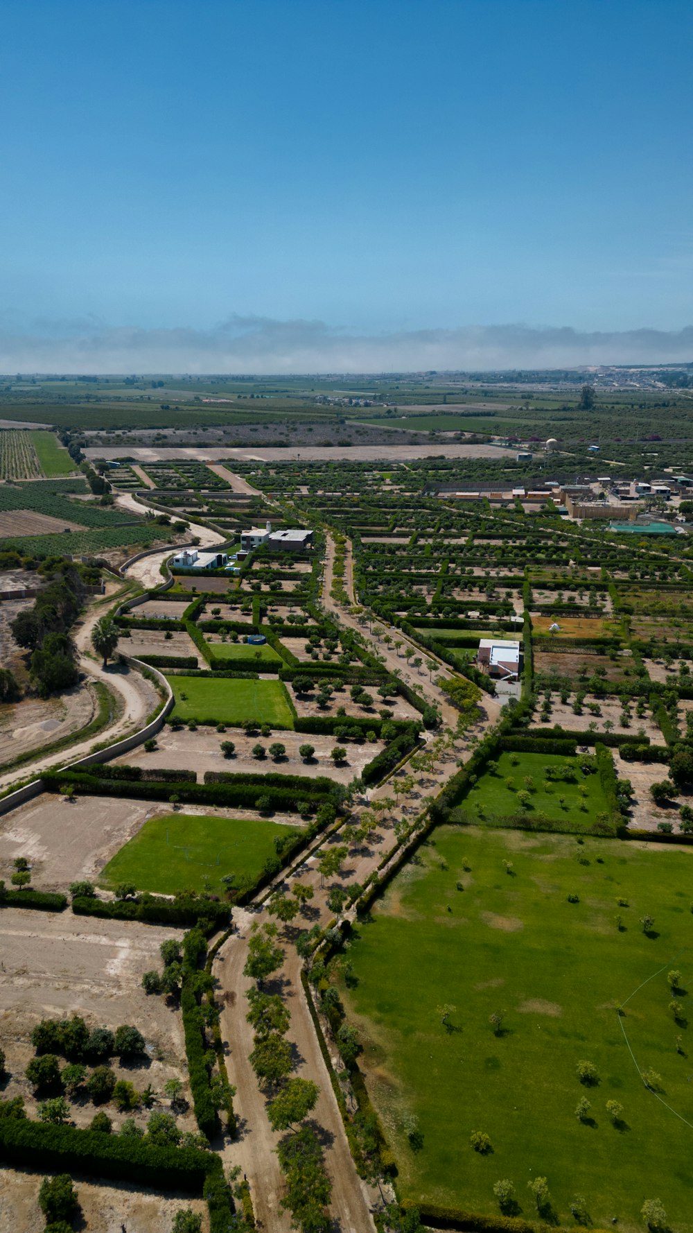 an aerial view of a rural area with lots of trees