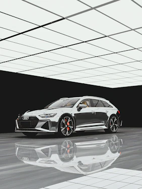 Sleek modern automotive workshop interior with metallic details and sophisticated lighting.