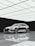 A beautifully finished metallic resin floor reflecting light in a modern garage.