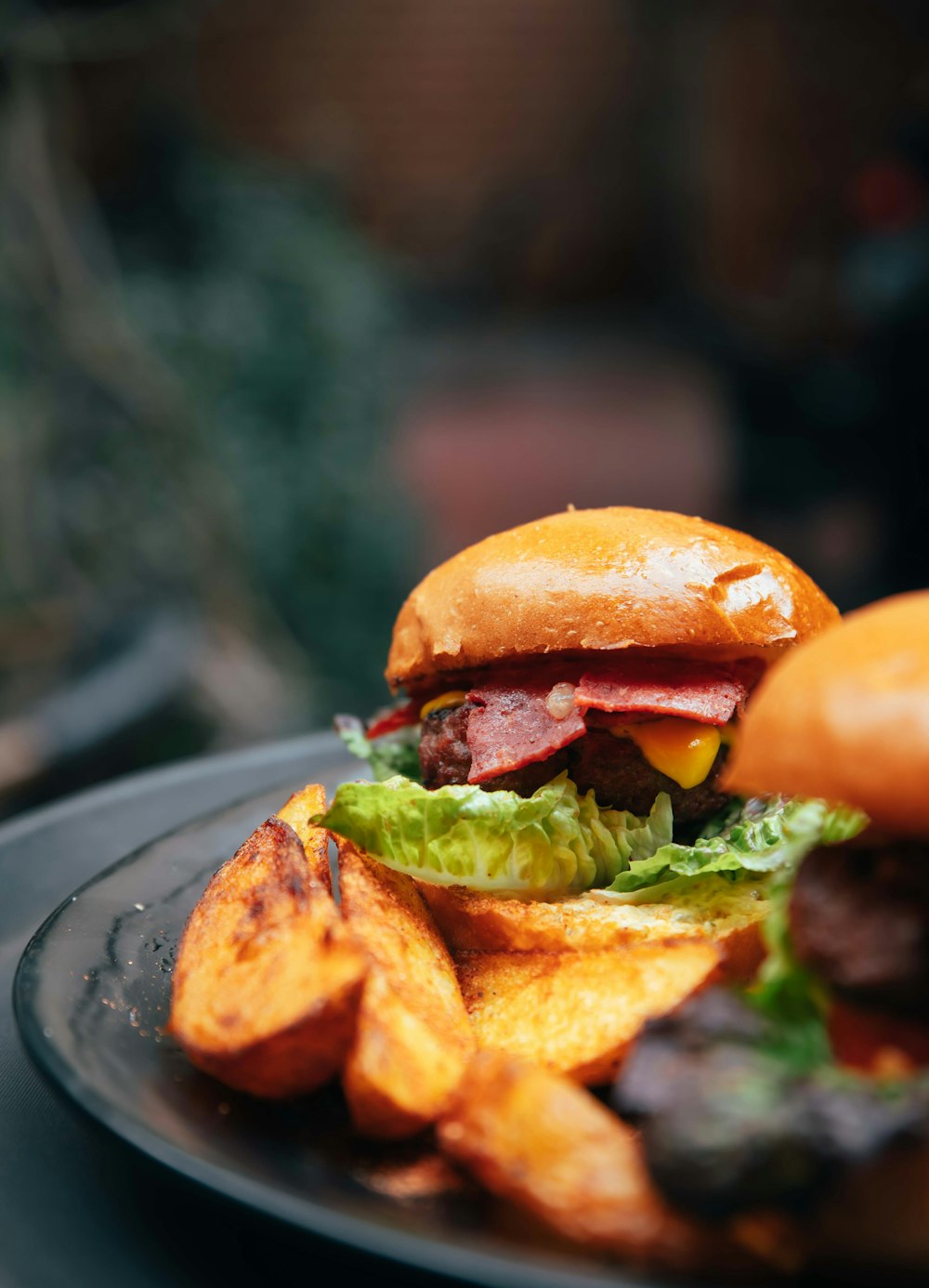 a close up of a plate of food with a sandwich