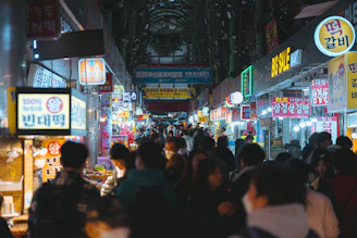 A vibrant street food market bustling with locals and tourists.