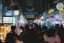 A vibrant street food market bustling with locals and visitors sharing smiles.