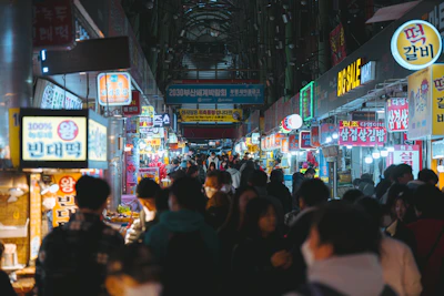 A vibrant street food market bustling with locals and tourists.