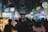 A vibrant street market filled with food stalls and colorful dishes.