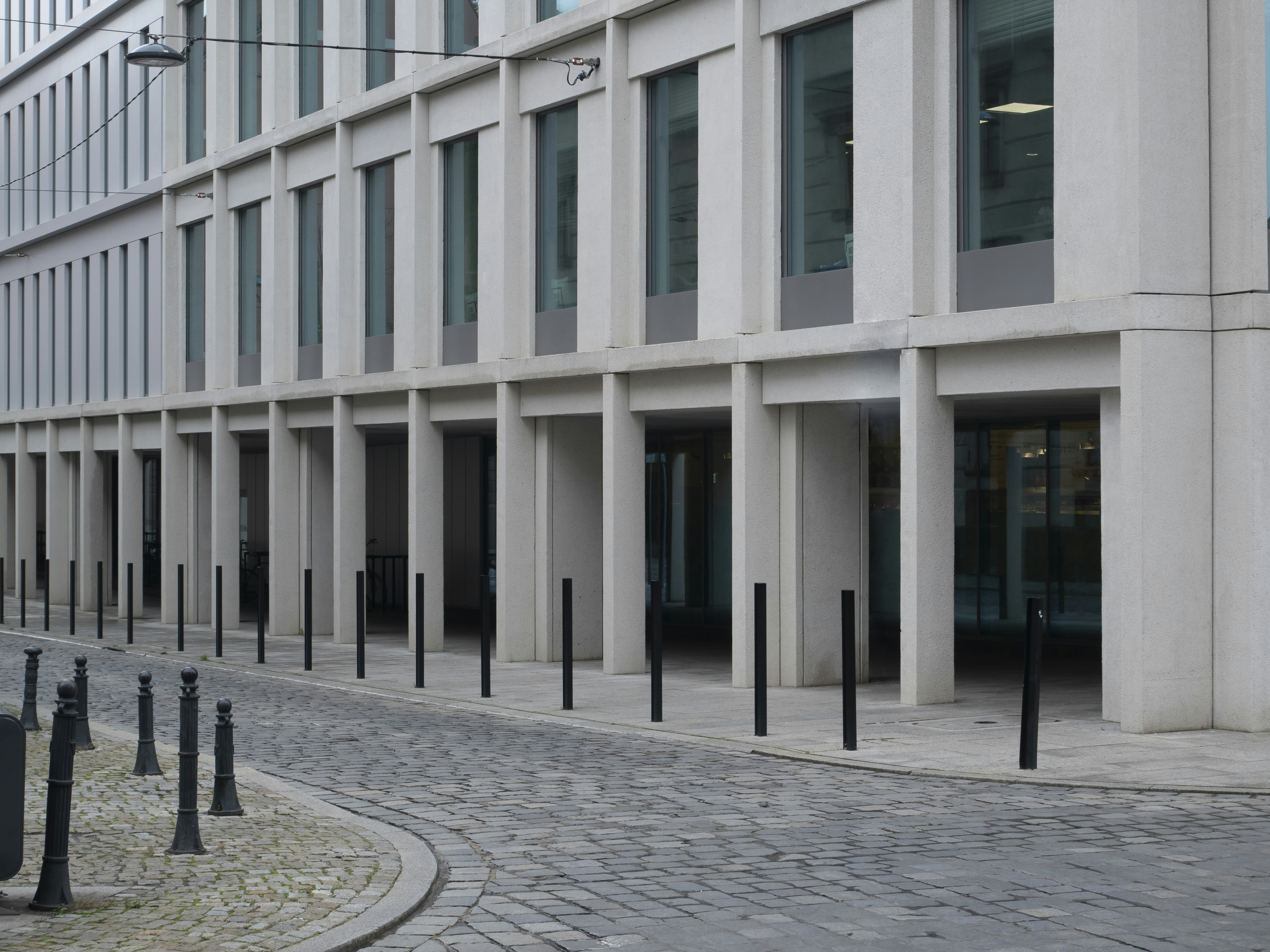 a large building with a lot of windows on the side of it