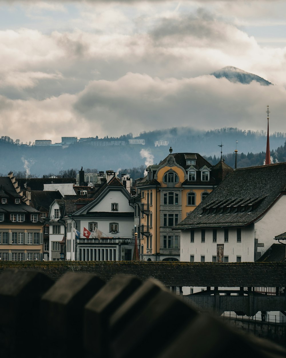 a view of a city with a mountain in the background