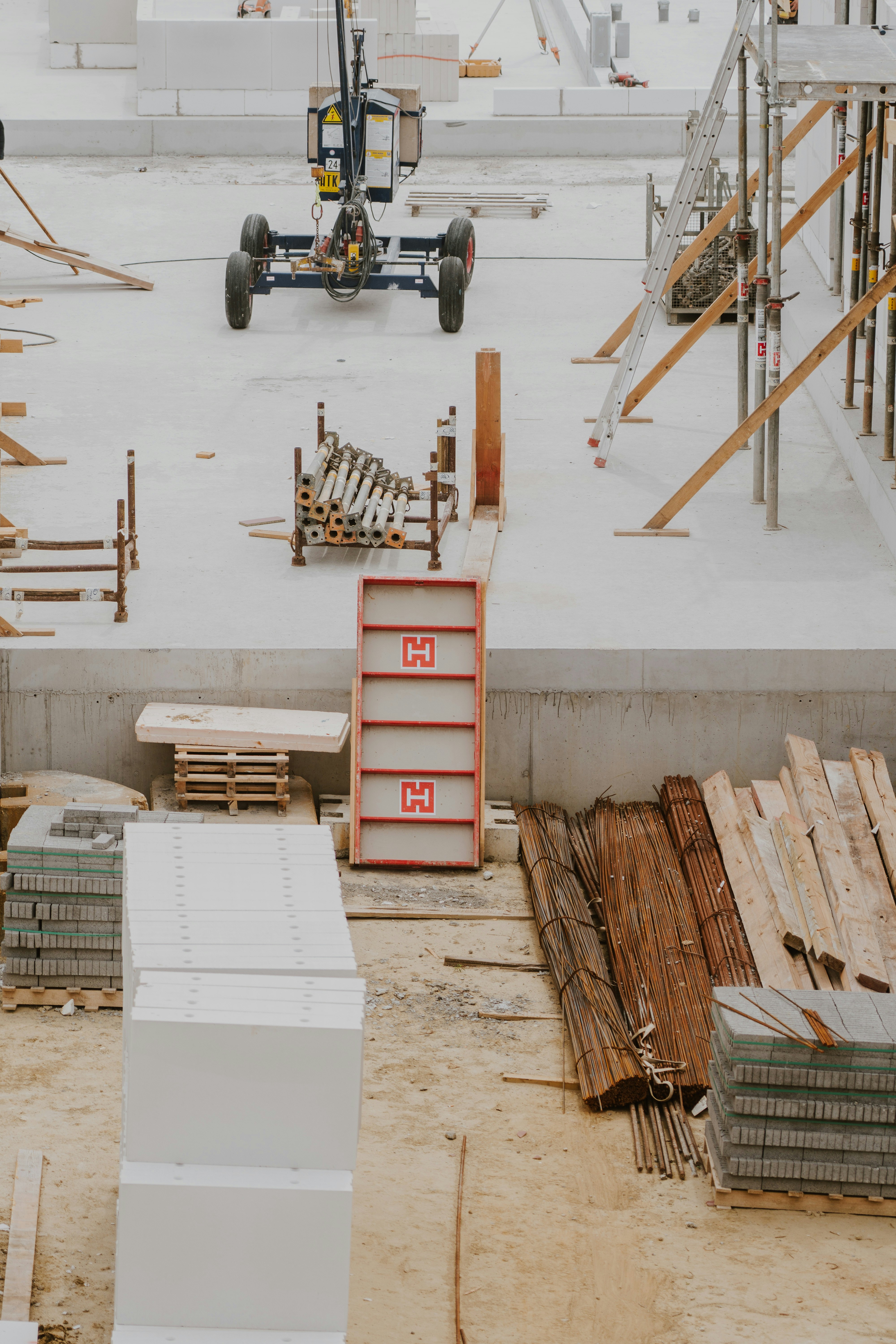 a construction site with a crane and construction equipment