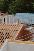 the roof of a building being built with scaffolding