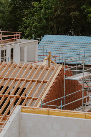 the roof of a building being built with scaffolding
