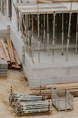 a building under construction with lots of wooden beams