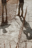 a couple of men standing next to each other