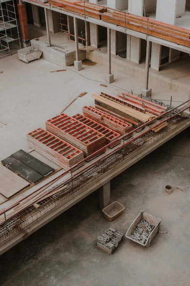 a large building under construction with a crane