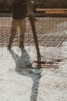 Items buried in concrete include cables, rebar, and conduit